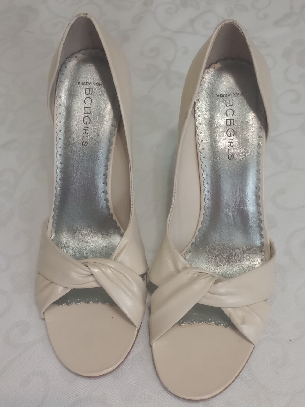 BCBGirls Cream Knotted Peep-Toe Heels